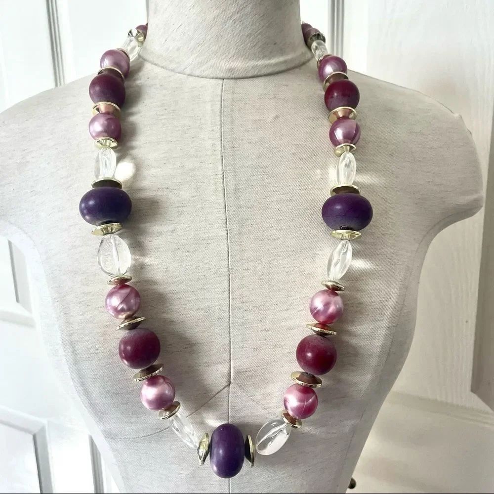 Purple clear and gold tone large beaded statement necklace